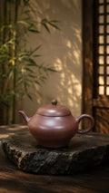 Handmade Pear-Shaped Yixing Zisha Teapot – Longxuesha Clay, 100ml